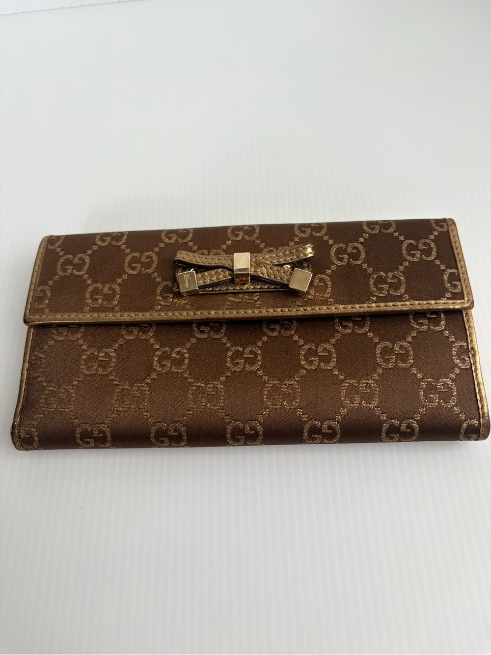 Gucci vintage  Brown GG Monogram Bow Continental Wallet with Gold Trim